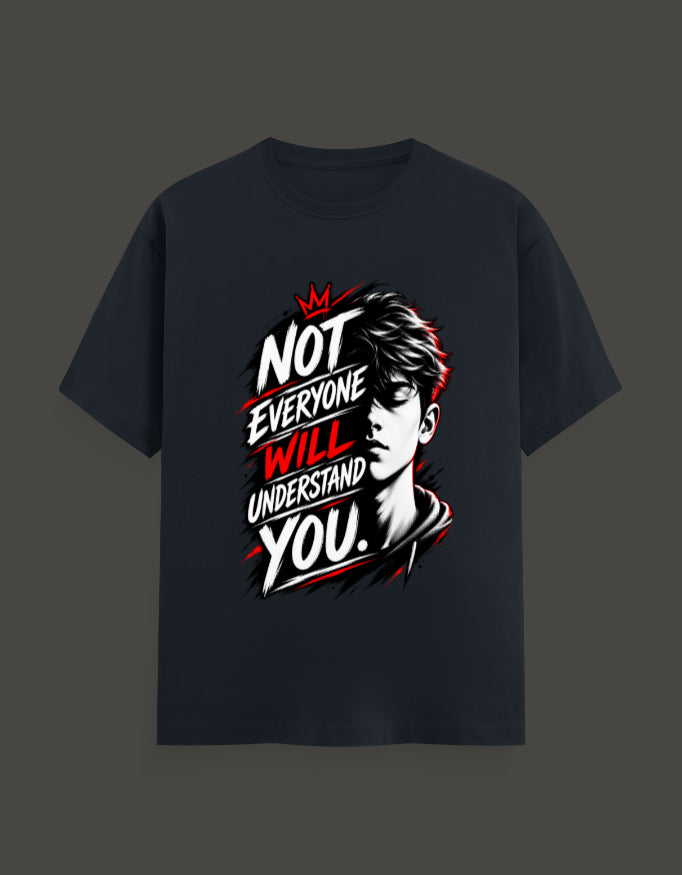 A dark navy blue short-sleeve t-shirt with a graphic print on the front. The graphic features a stylized black and white portrait of a man's face with red highlights, overlaid with the text 'NOT EVERYONE WILL UNDERSTAND YOU.